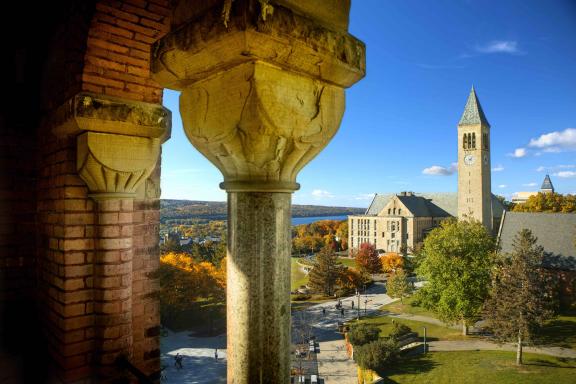 Cornell campus with clock tower during fall